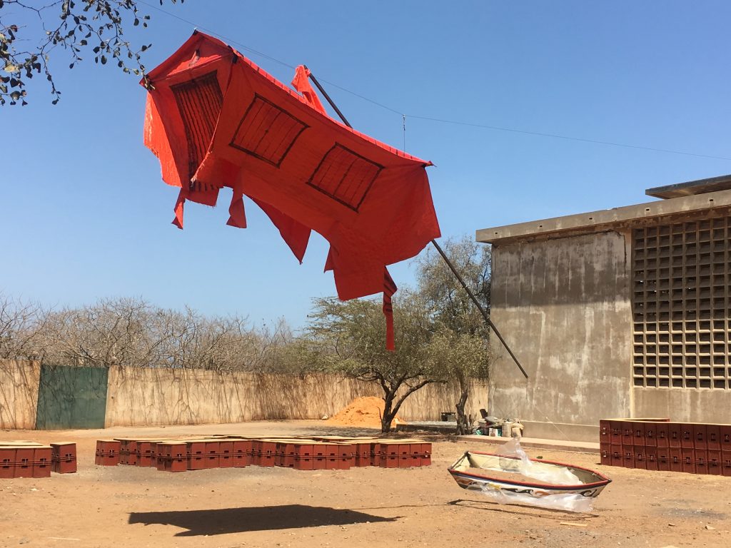 Marcos Lora Read (Dominican Republic), La Casa Roja de Caronte, 2018. Installation view, Dak'Art Biennale 2018 "The Red Hour/A New Humanity" curated by Simon Njami. Photo credit: The Sole Adventurer.