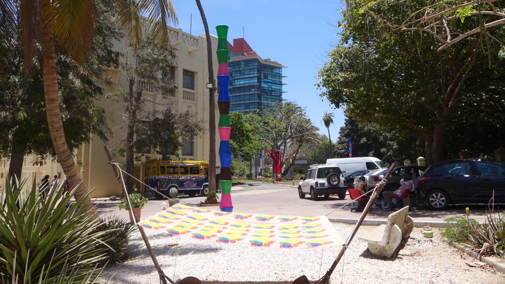 Satch Hoyt, Kush yard Totem, and Lorenzo Sandoval, Hammock Score No.1. Installation view, Dak'Art Biennale 2018 "Canine Wisdom for the barking dog-the dog done gone deaf: Exploring the Sonic Cosmologies of Halim El Dabh" curated by Bonaventure Soh Bejeng Ndikung. Photo credit: The Sole Adventurer.