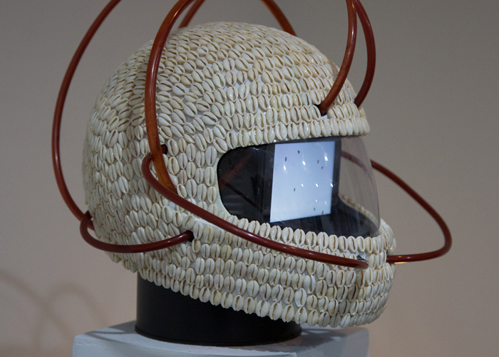 Emo de Medeiros, Vodunaut #2 (Hypercharger), 2015. Helmet, cowry shells, paint, plastic tubes, smartphone via artafricamagazine.com