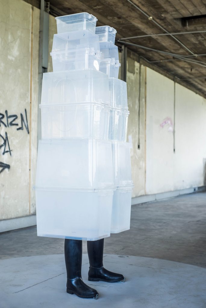 Pedro Pires, "Container/invisibility", 2019, concrete, plastic boxes and rubber boots