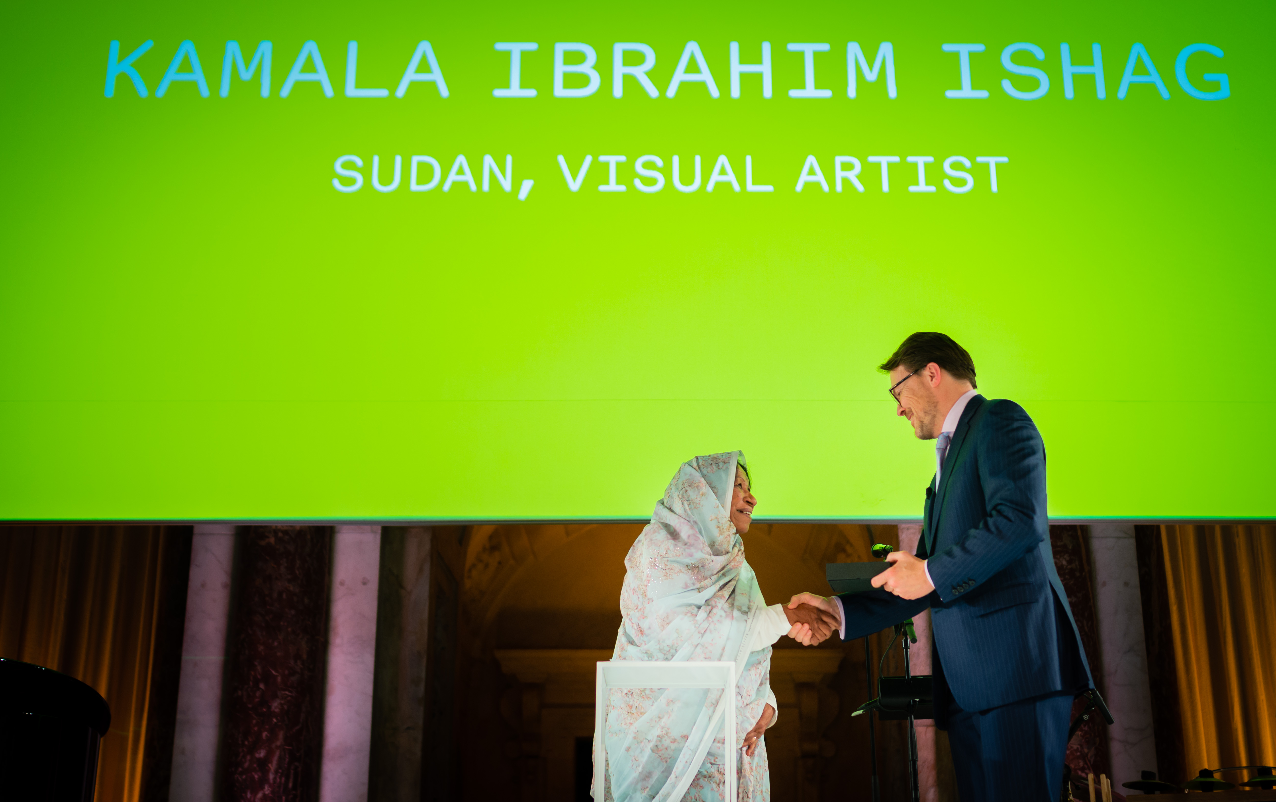 Kamala Ibrahim Ishag officially receiving the Principal Award at the 2019 Prince Claus Awards Ceremony. Photo credit: Prince Claus Fund / Frank van Beek