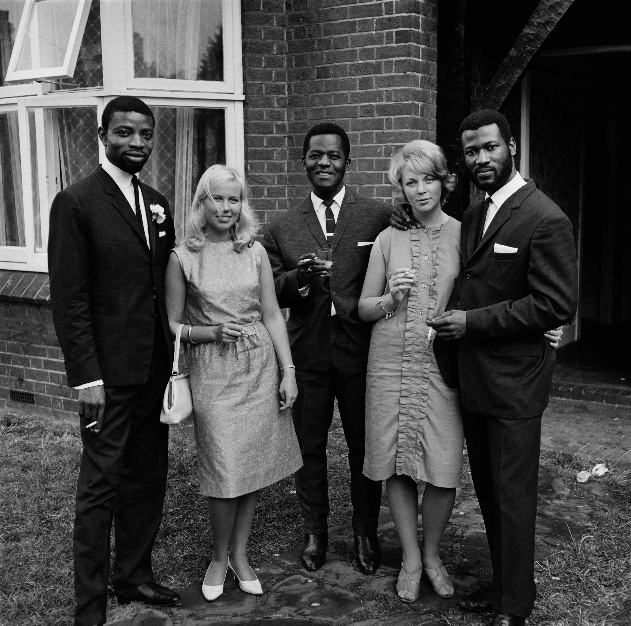 Date: c.1966 Caption: A group of friends photographed during Mr. And Mrs Sackey’s wedding, London.